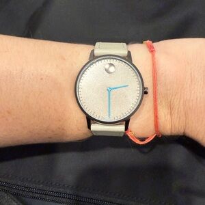 Movado Stylish Cream Watch with Blue Hands